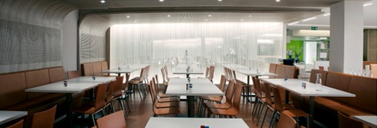 Kinetic glass walls for a staff restaurant in Paris